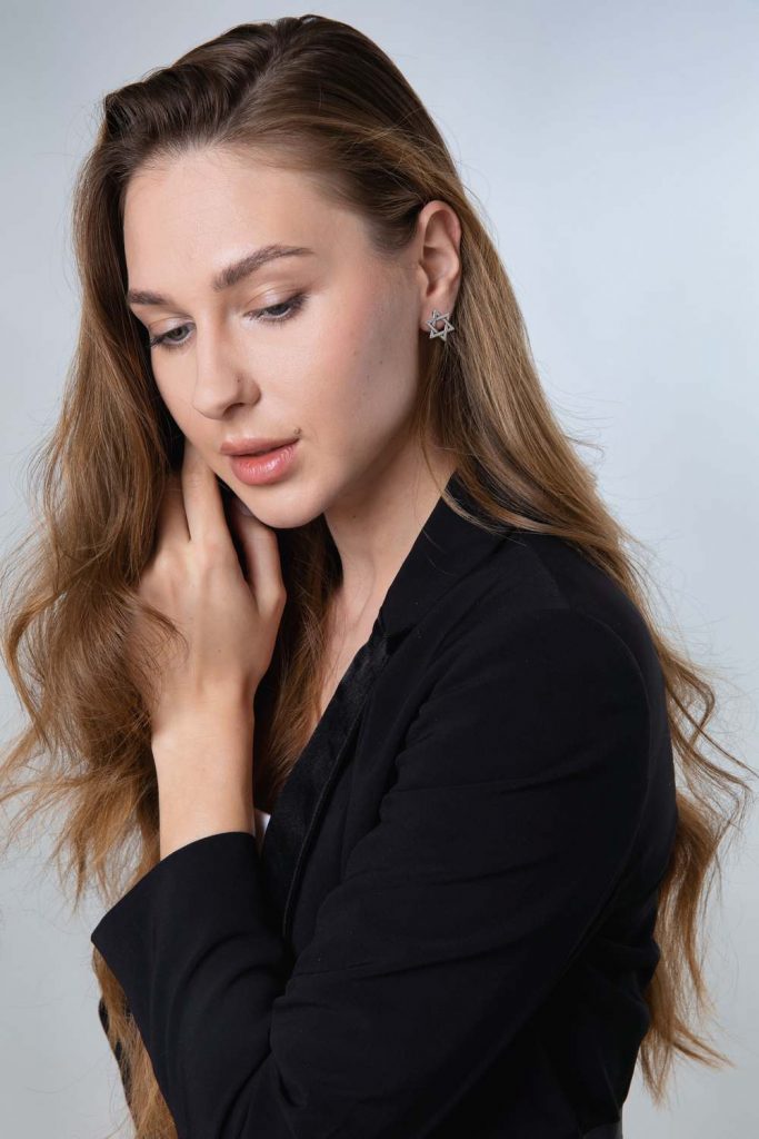 model with lab grown diamond earrings